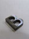Буква из нержавейки. hspace=